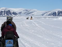 02A Our Ski-Doos And Qamutiik Sleds Are Stopped At A Break In The Ice On Day 2 On Floe Edge Adventure Nunavut Canada